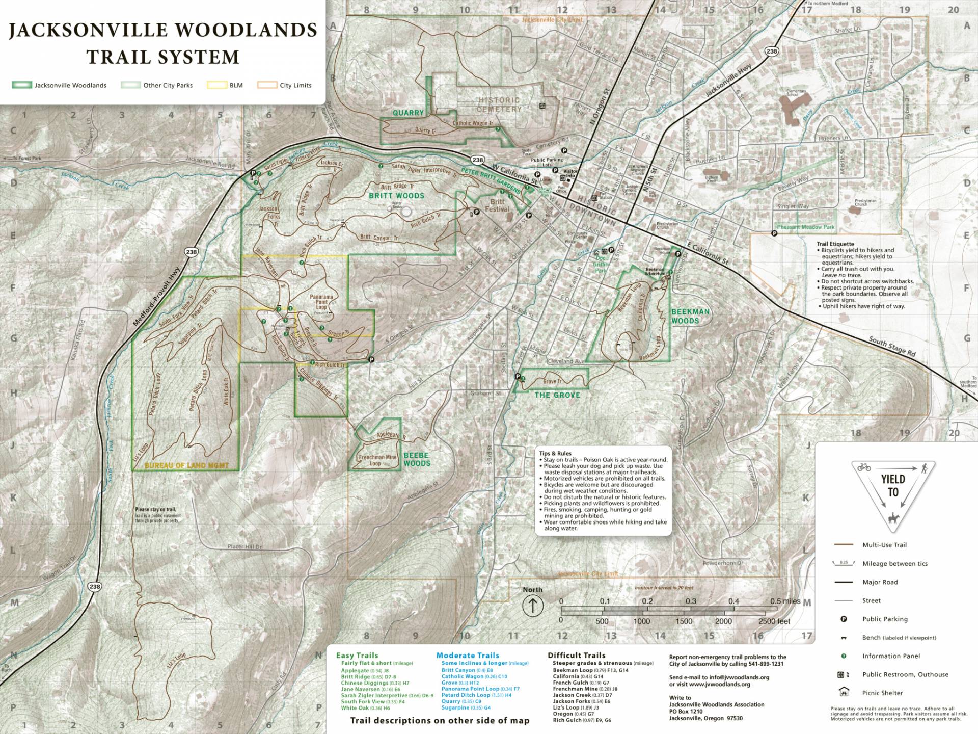 Facilities, trail, and recreation map of the Jacksonville Woodlands Trail System, featuring street names, major roads, points of interest, detailed trail descriptions, and difficulty levels.